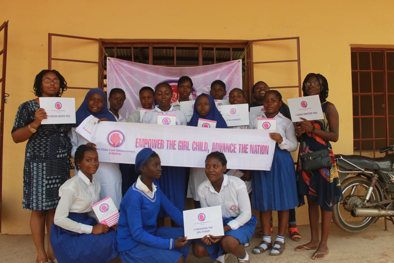 Students and GCCAI volunteers during a Road to Illuminate school visit